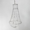 TOVE ADMAN. Ljuskrona. Taggtråd med små ljuspunkter. Fafner Form. 2000-tal.