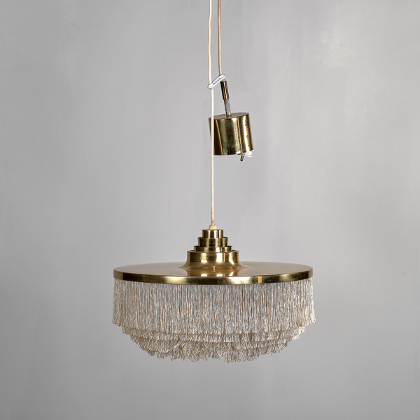 HANS AGNE JAKOBSSON. Taklampa. Mässing och fransar. Markaryd. 1960-tal.