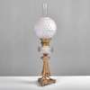 BORDSFOTOGENLAMPA. Glas och bronserad metall. Omkring 1900.