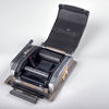 ROLLFILMSBAKSTYCKE. Linhof Super Rollex. 120-rollfilm. 1950-tal.
