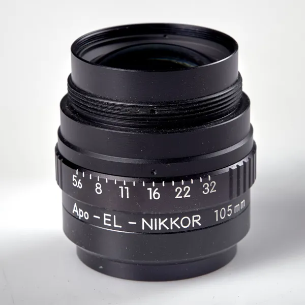 OBJEKTIV. Nikon. Apo-El-Nikkor 105 mm 1:5,6 804623. 1970-tal.