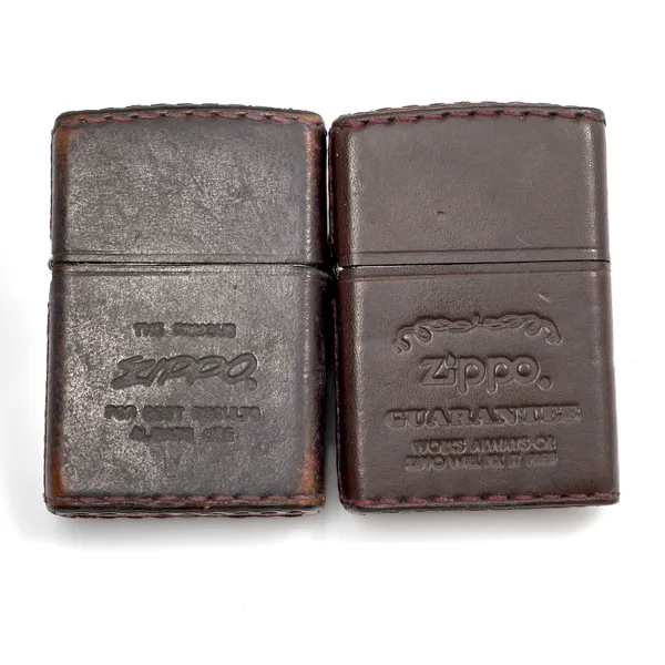 TÄNDARE ZIPPO. 2 stycken. Guarantee Brown Leather Wrap. The Famous Leather Wrap Lighter.1991.