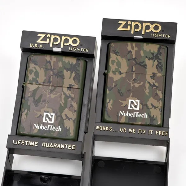 TÄNDARE ZIPPO. 2 stycken. NobelTech Camouflage. 1992.