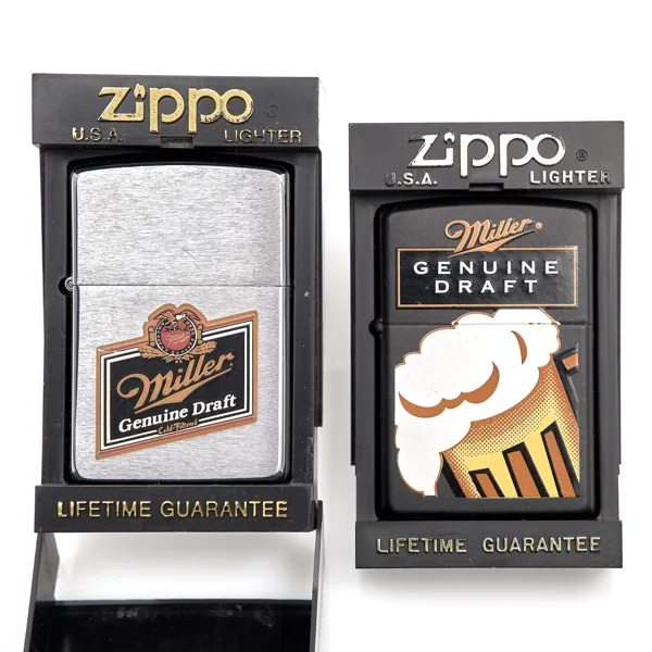 TÄNDARE ZIPPO. 2 stycken. Miller Genuine Draft. 1994. Miller Genuine Draft Black Matte. 1995.