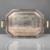 SERVERINGSBRICKA. Nysilver med benhandtag. Oktagonal form. Omkring 1900.